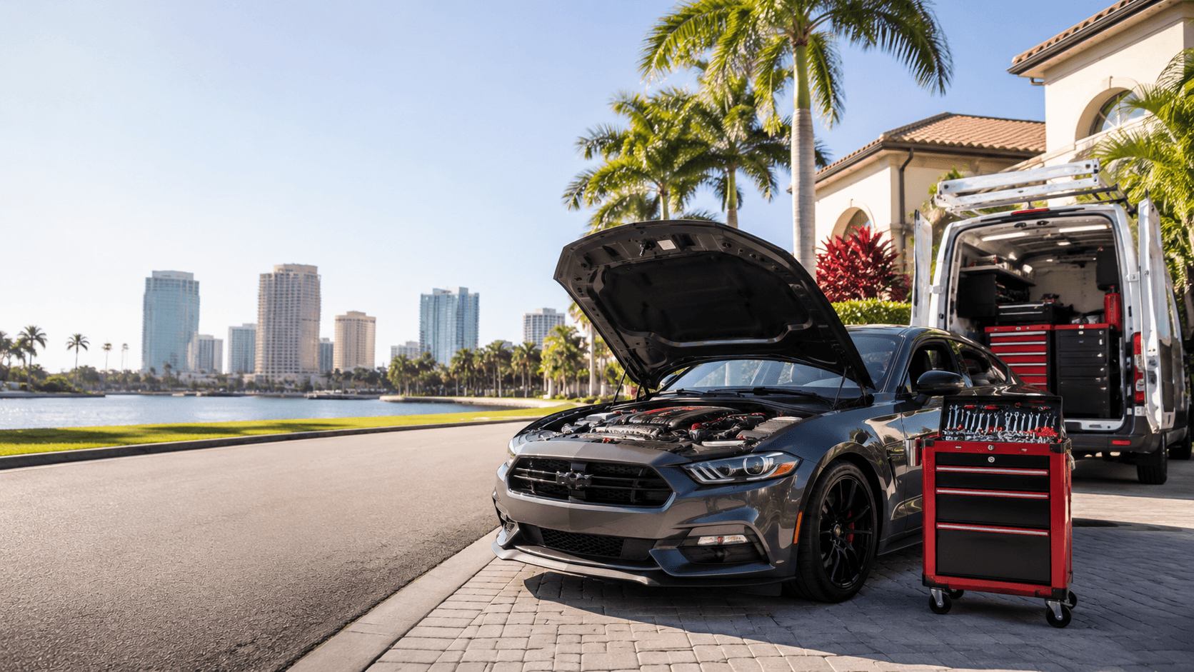 Mobile mechanic working on a vehicle in a Florida driveway